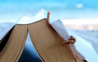 reading a book at the beach