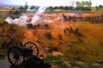 Painting of battle on Gettysburg battlefield.