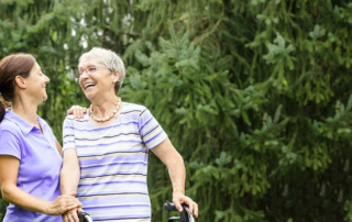 Two women outdoors laughing