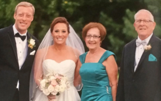 Bride and groom with their family.