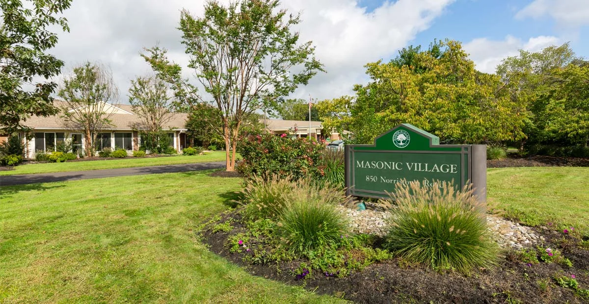 Masonic Village at Warminster sign outside of building.