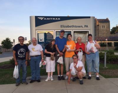 Bleiler Caring Cottage residents volunteer to clean up Amtrak station