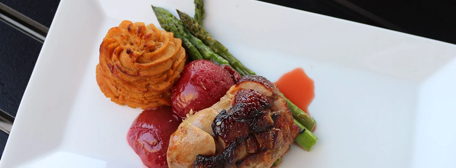 Dinner Plate Design Gourmet chicken and vegetables on a white plate.