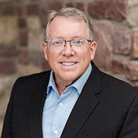 Dr. Davis standing outdoors Dr. Davis standing outdoors