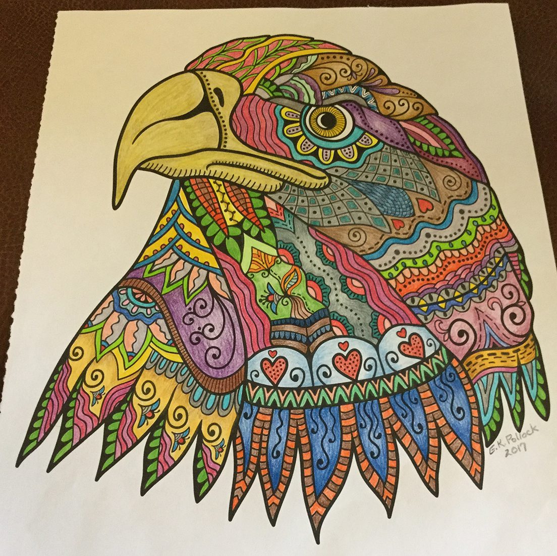 Coloring page of a falcon with many colors/patterns