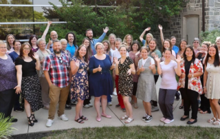 Staff celebrating outdoors