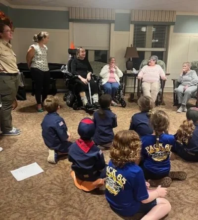Group of seniors and children at a "Campfire Chat" event at Masonic Villages.