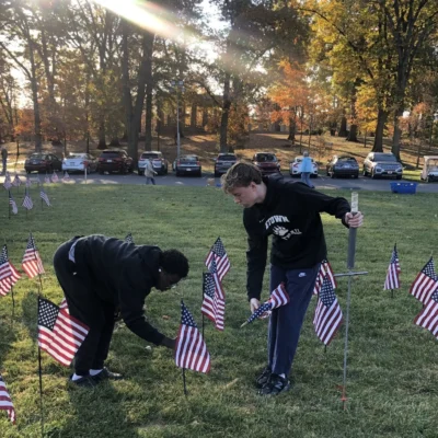 Masonic Children's Home residents assist with the Massing of the Colors display at Masonic Village