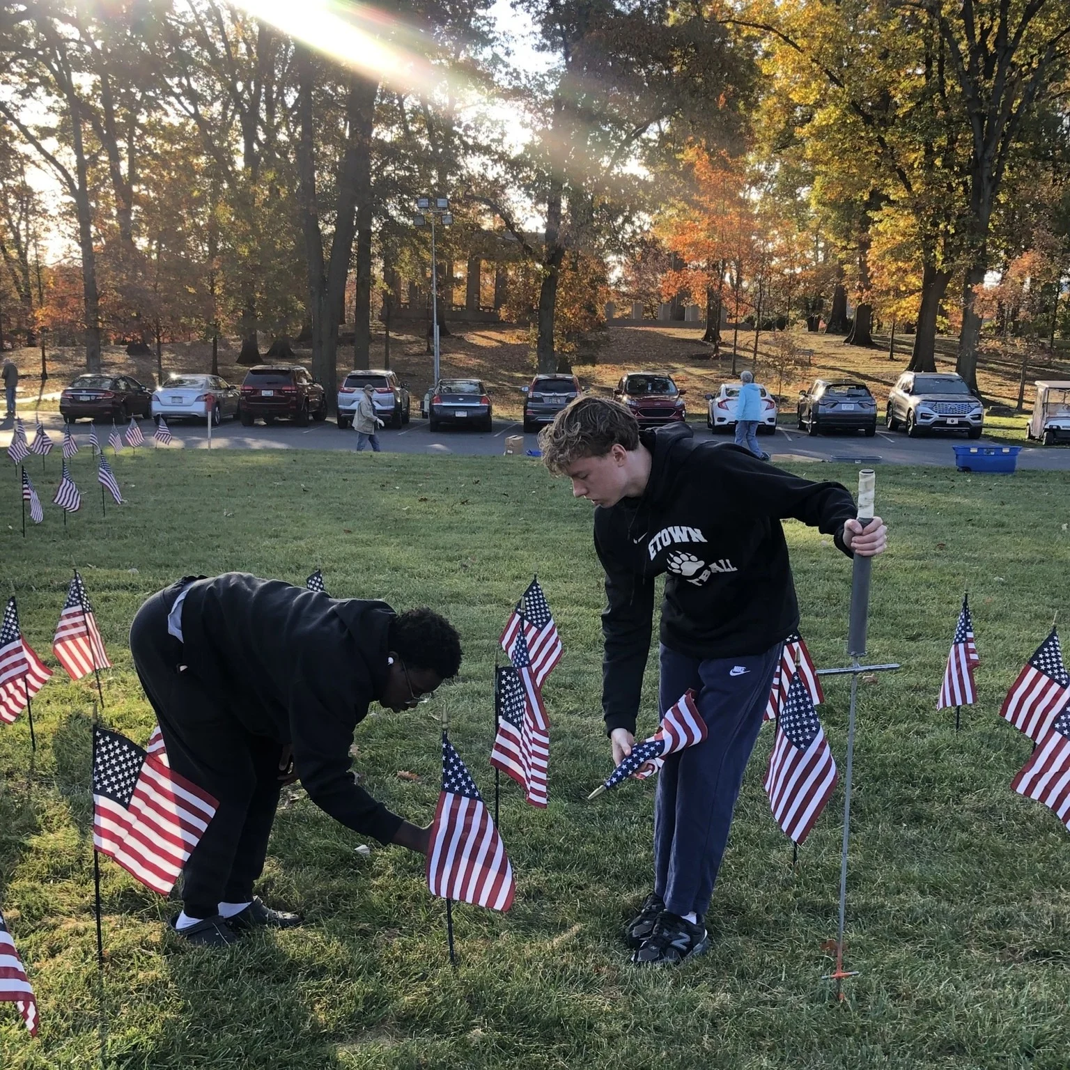 Masonic Children's Home residents assist with the Massing of the Colors display at Masonic Village