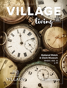 Elizabethtown Village Living cover featuring closeup of watch faces.