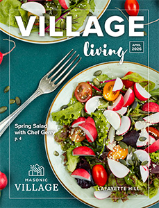 Lafayette Hill Village Living magazine cover featuring a fresh salad on a plate.