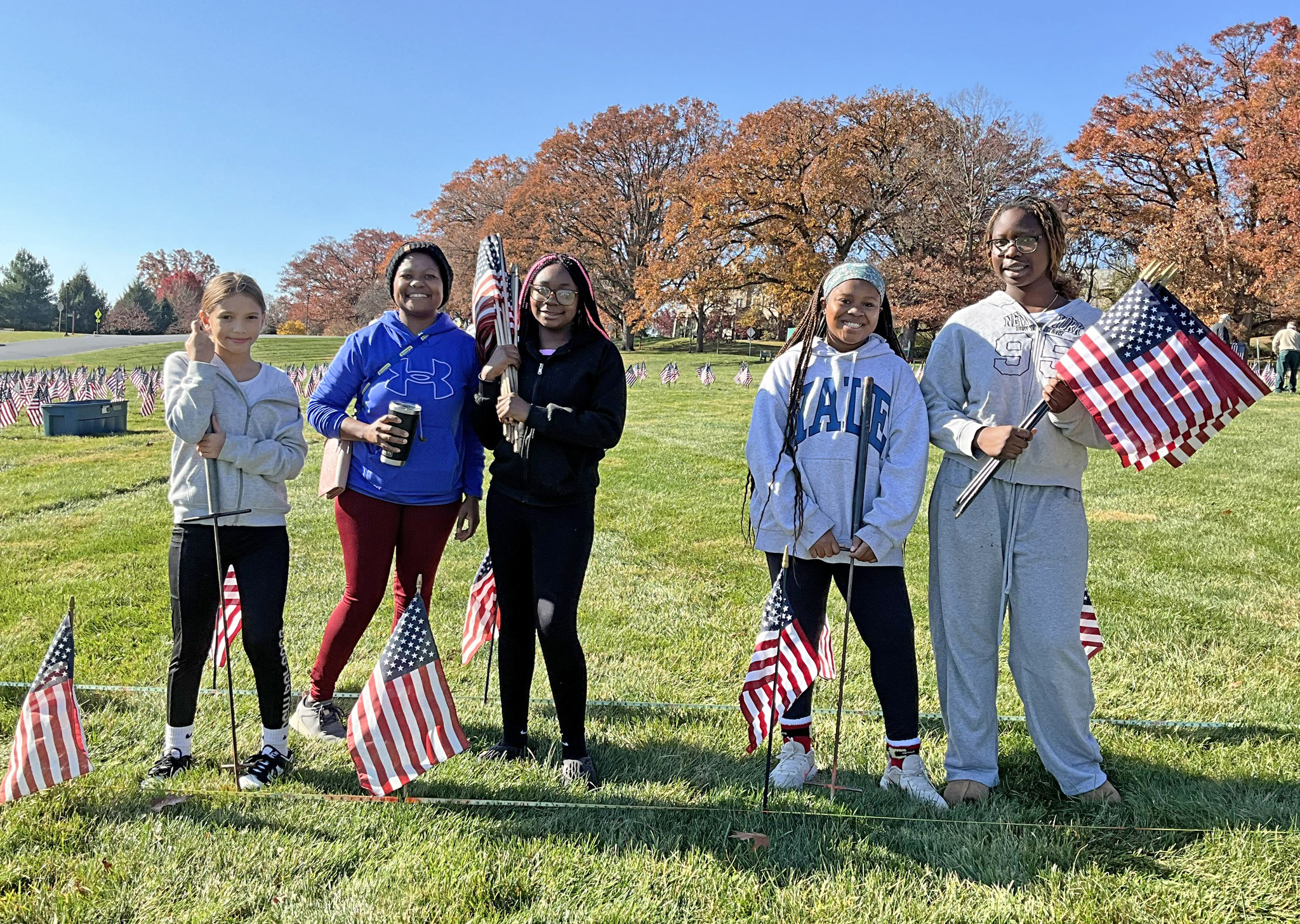Masonic Children's Home residents assist with the Massing of the Colors display at Masonic Village