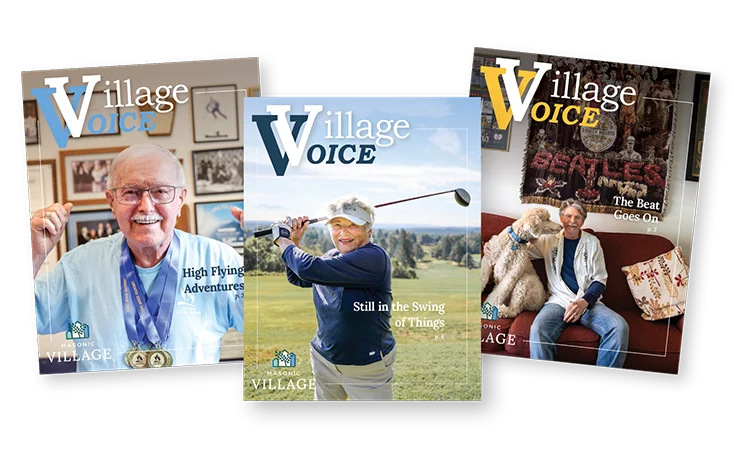 Three overlapping issues of "Village Voice" magazine featuring smiling seniors on the front covers.